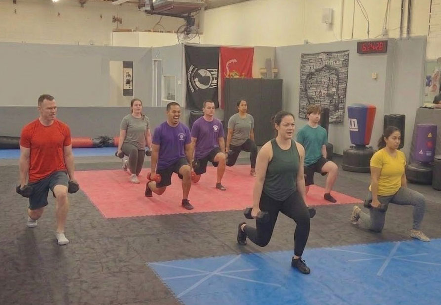 Adults participating in workout class